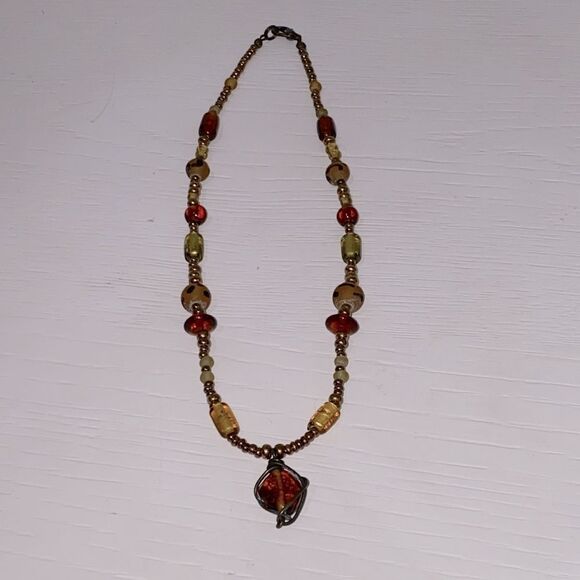 Vintage Boho Beaded Necklace with Drop Dangle Caged Bead Brown and Gold Accents - Picture 6 of 11